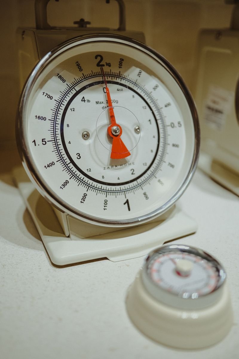 Close-up of a digital kitchen scale weighing ingredients